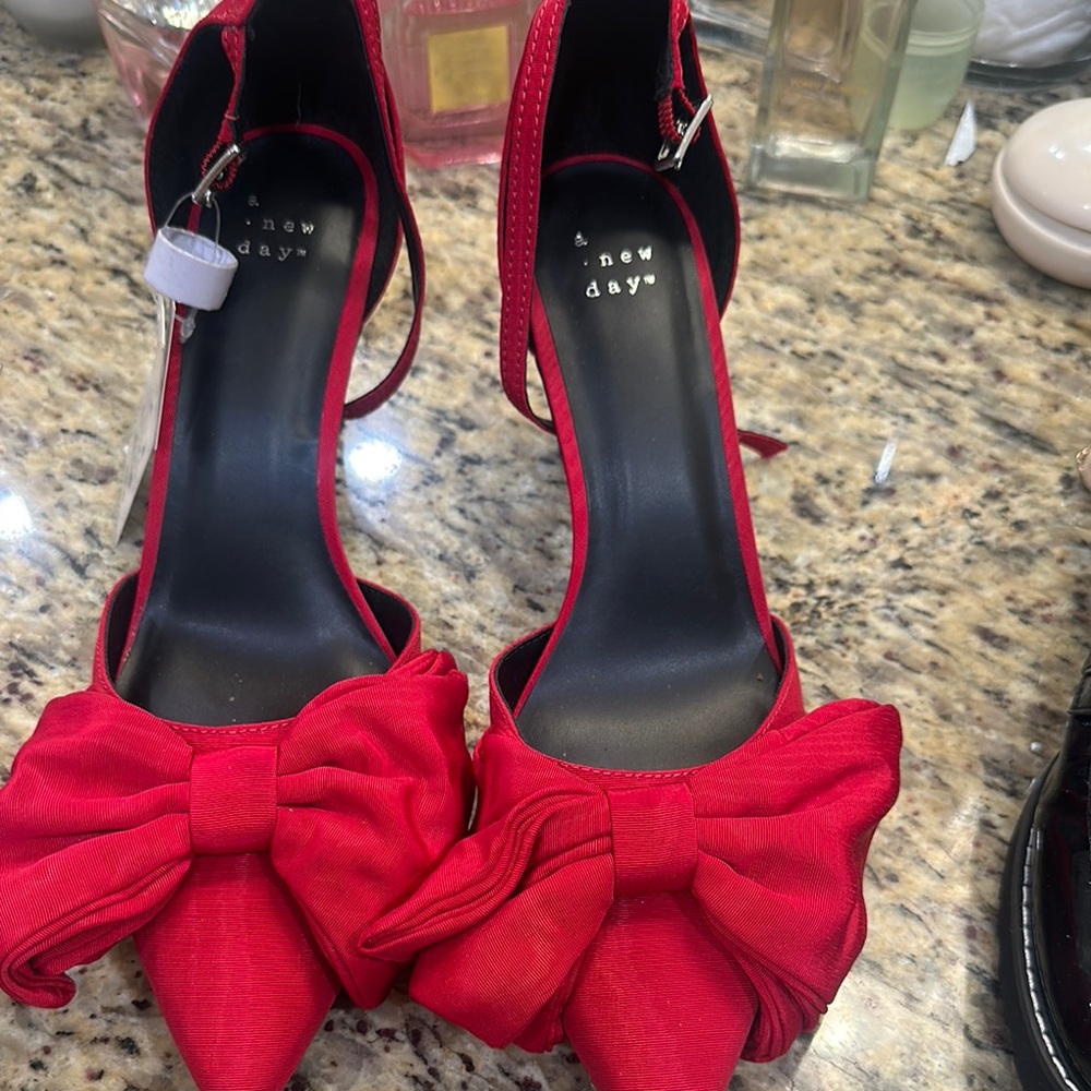 A New Day Red Heels with Dramatic Bow